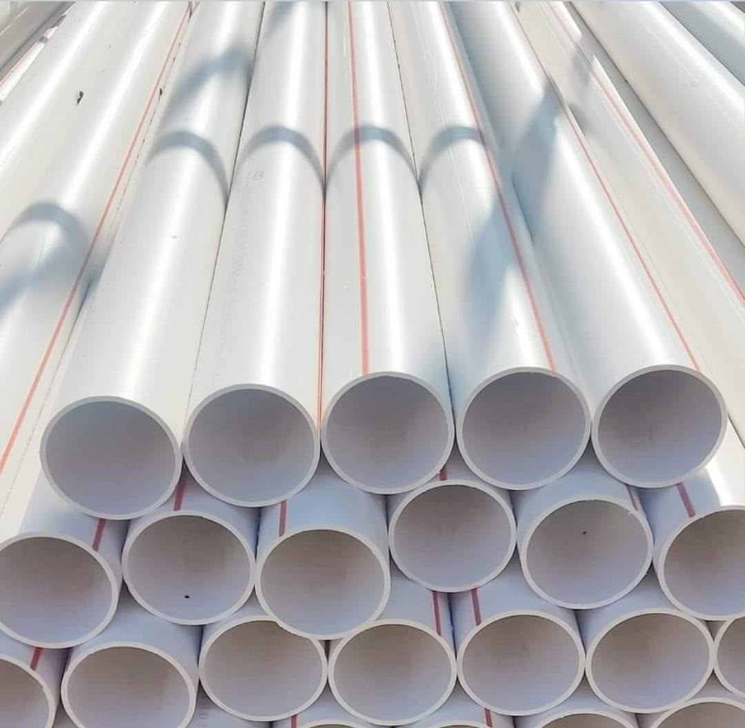 Aqtar Najd white UPVC pressure pipes with red identification stripe