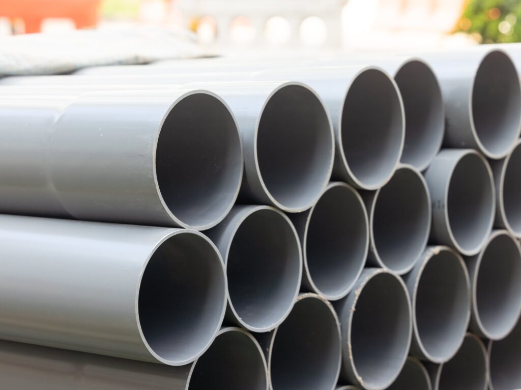 Lightweight perforated pipes organised neatly in stacked rows
